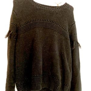 Woman’s sweater.